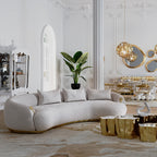 Luxury Curved Sofa with Hand-Hammered Polished Brass Base & Cream Upholstery Design