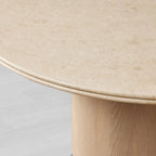 Table à manger ronde Caden avec plateau en pierre, en noyer ou en chêne avec piètement sculptural