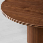 Caden Round Dining Table with Wooden Top Sculptural Base & Antiqued Metal Plinth