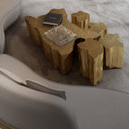 Luxury White Coffee Table with Sculptural Gold Base & Organic Modern Design