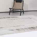 Tapis de zone neutre abstrait Meilade encadré avec cadre moderne de luxe léger avec tapis de style superposé