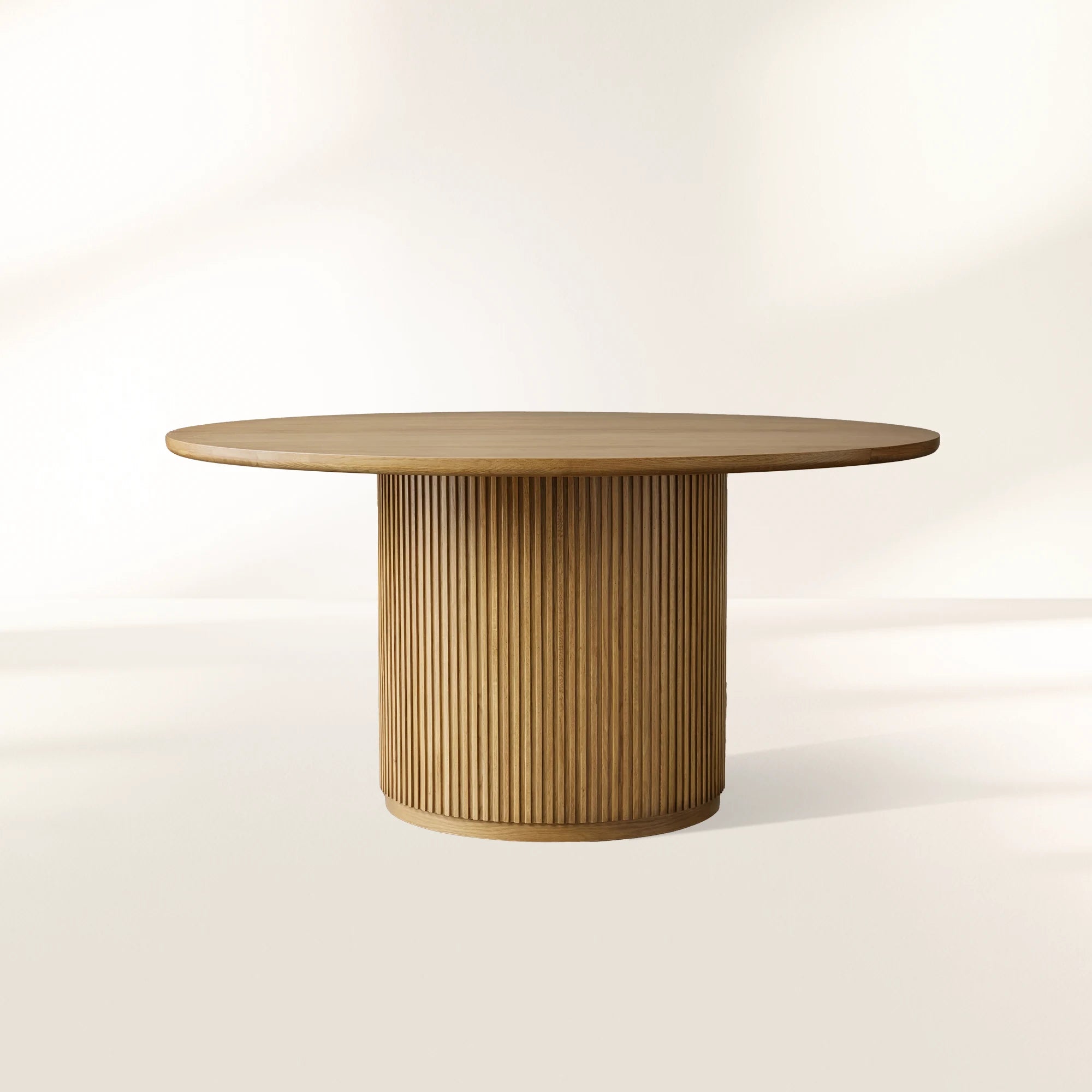 Finnley Wood Round Dining Table with Reeded Detail Base