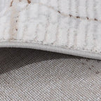 Tapis de zone moderne Puxina Layered Trace Calm avec motif esquisse déstructuré à ligne marron