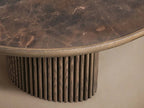 Couchtisch Astor mit ovalem Holzsockel und Marmorplatte