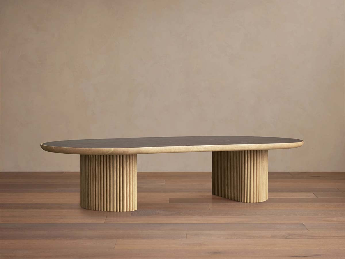 Couchtisch Astor mit ovalem Holzsockel und Marmorplatte